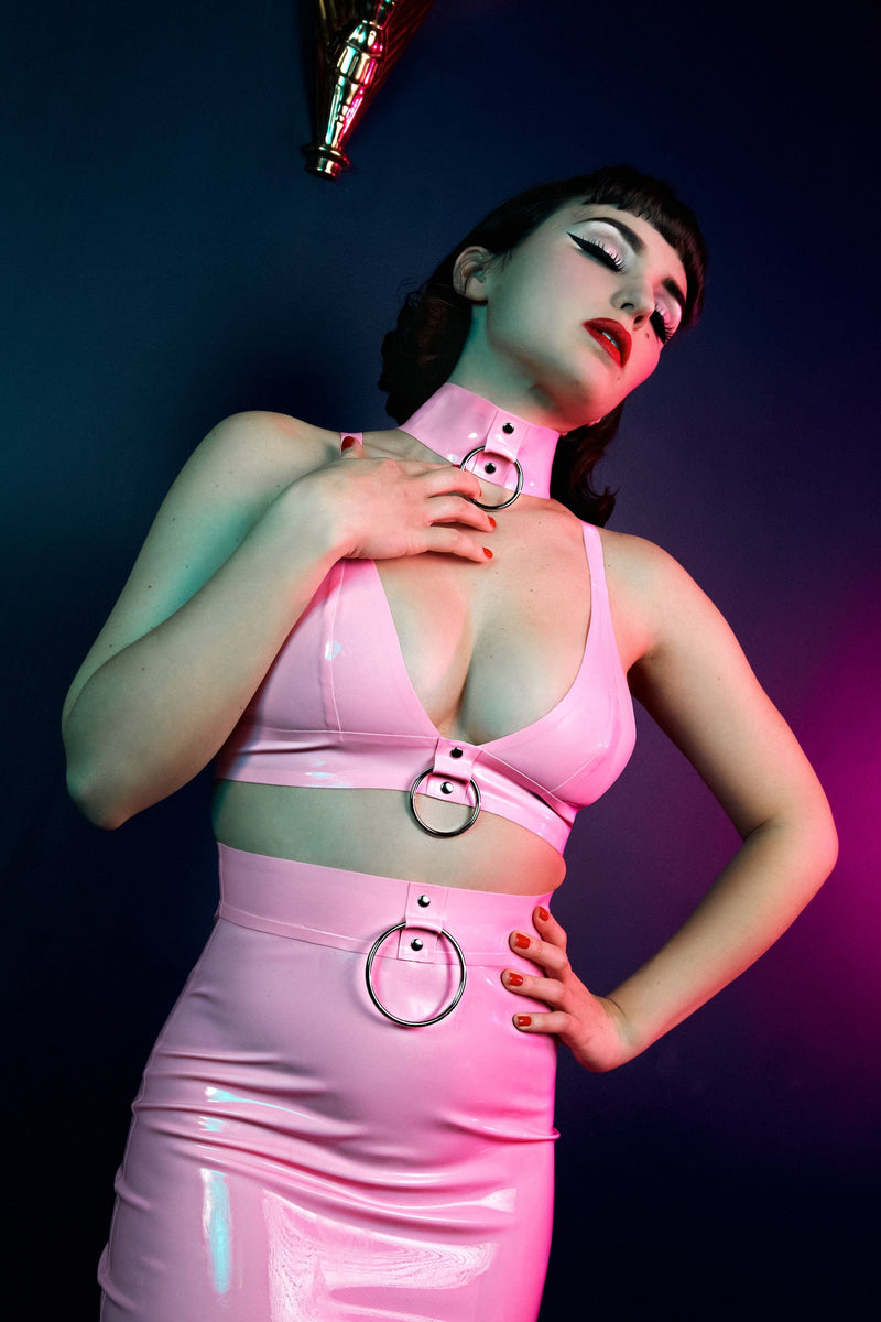 https://www.playfulpromises.com/cdn/shop/products/bettie-page-lingerie-bra-imogen-pink-latex-and-ring-bra-31158418505776_800x.jpg?v=1673880836