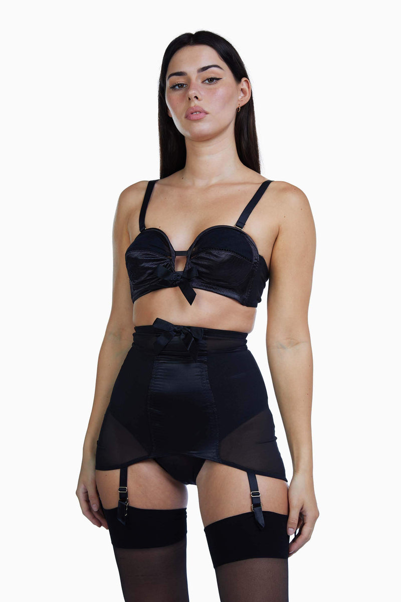 https://www.playfulpromises.com/cdn/shop/products/bettie-page-lingerie-core-suspender-bettie-page-satin-girdle-15567308226608_800x.jpg?v=1639152501